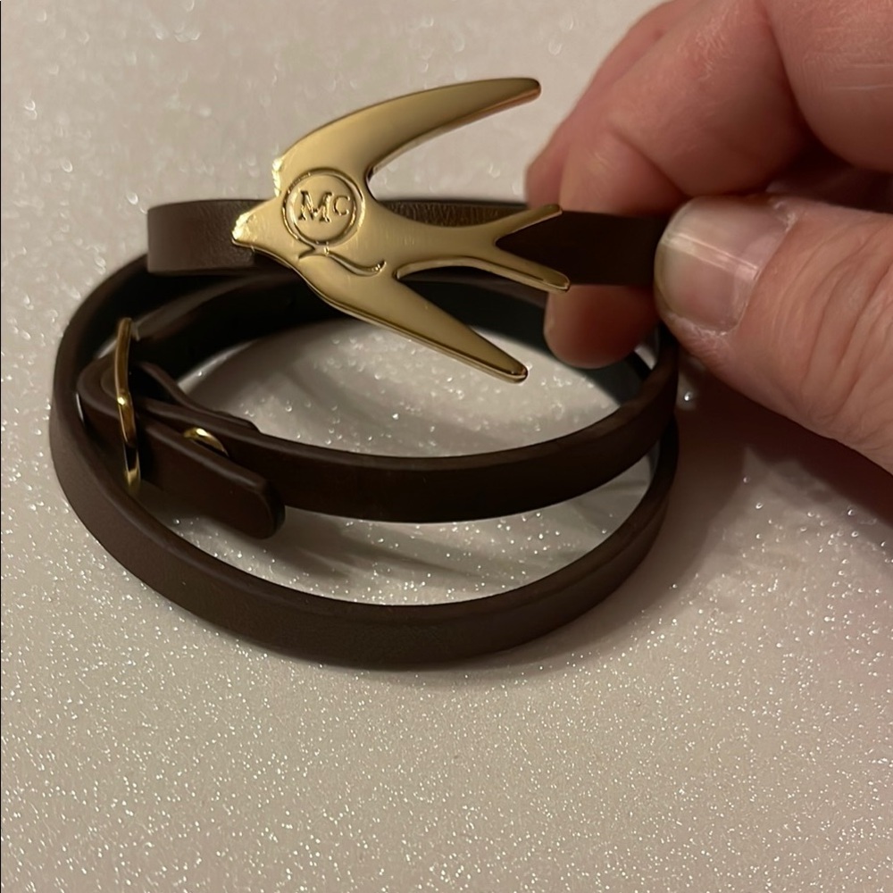 Alexander McQueen Brown Leather Bracelet with Gold Bird Accent.